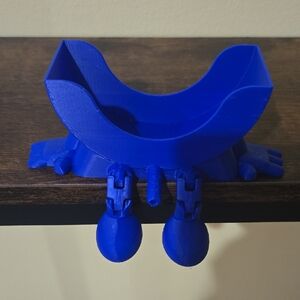 Blue 3D Printed Shelf Bracket Scrub Daddy Holder.